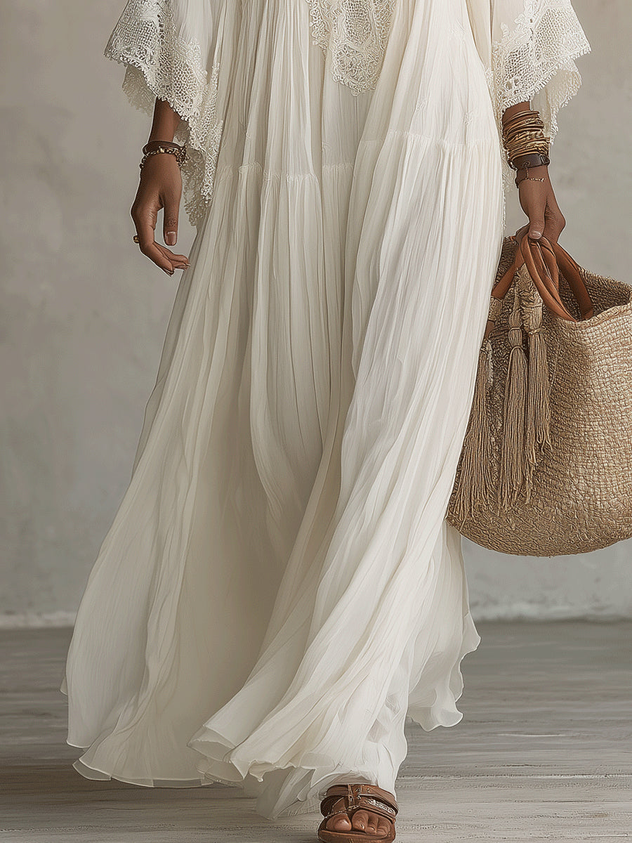 Serena | Abito lungo in chiffon bianco con scollo a V, maniche a pipistrello e pizzo bianco