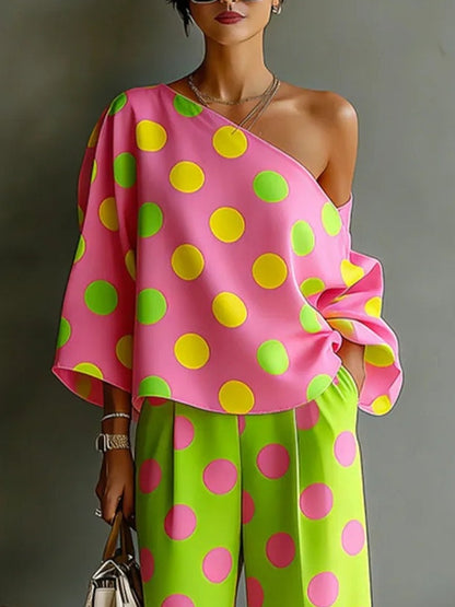 Rossana | Set di due pezzi con blusa senza spalle a pois colorati e pantaloni a gamba larga