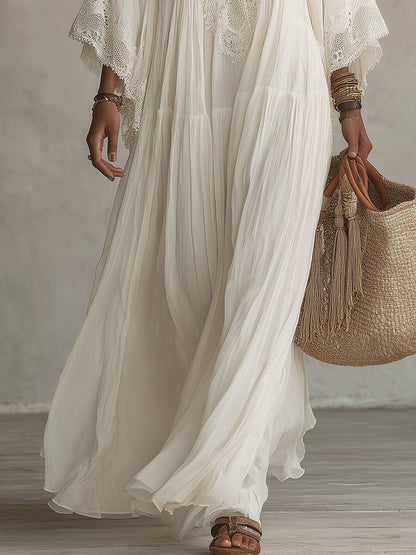 Serena | Abito lungo in chiffon bianco con scollo a V, maniche a pipistrello e pizzo bianco