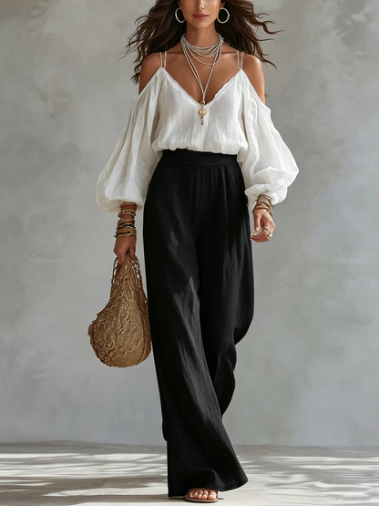 Nicoletta | Completo con top bianco a spalle scoperte e pantaloni neri a palazzo